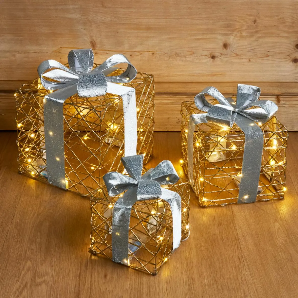 EMINZA Lot de 3 cadeaux lumineux à piles 90 LED (H29 cm) Festif et blanc chaud Or Hot