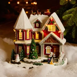 KAEMINGK Maison de village illuminée musicale et animée à piles (H23 cm) Camden Street Multicolore Discount