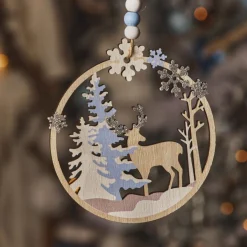 KAEMINGK Suspension de Noël en bois (D11 cm) Caribou dans les bois clair Bleu Hot