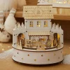 KAEMINGK Village de Noël en bois lumineux et musical à piles (H19 cm) Maison de famille Hot