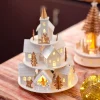 KAEMINGK Village de Noël en bois lumineux et musical à piles (H28 cm) Maisons sur colline