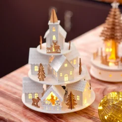 KAEMINGK Village de Noël en bois lumineux et musical à piles (H28 cm) Maisons sur colline